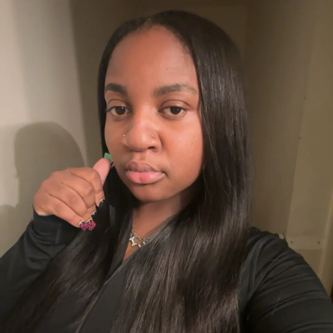 Sleek silk press with straight middle part