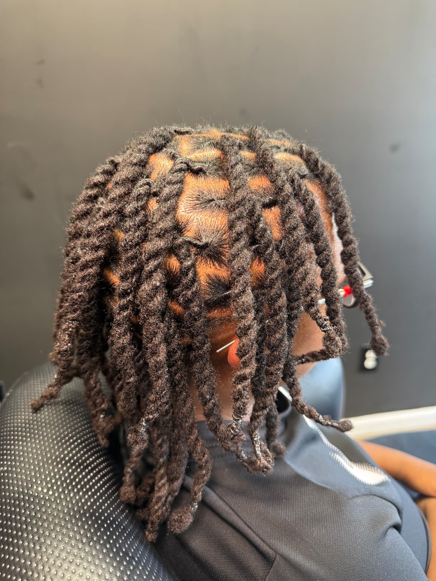 Locs styled in two-strand twists